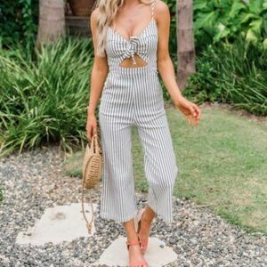 White and black striped jumpsuit with cut out